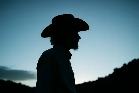 Petite Sage in a Cotton Shirt and Cowboy Hat