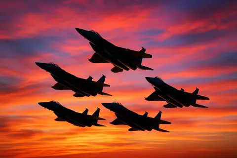 Group of Military Aircraft Flying in a Sharp Triangular Arrangement