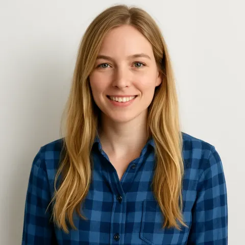 Woman with Long Blonde Hair Wearing a Blue Checkered Shirt