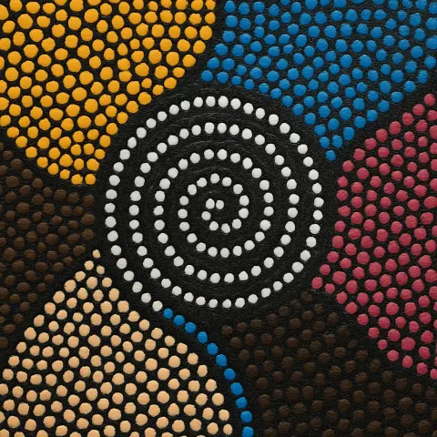 Abstract Dot Painting Featuring a Central Spiral Pattern