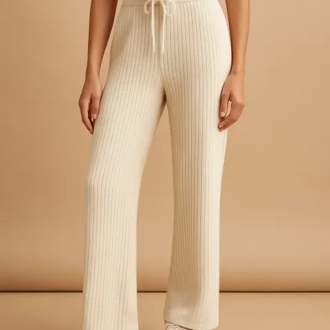 Person Wearing Cream-colored Ribbed Knit Pants with a Drawstring Waist