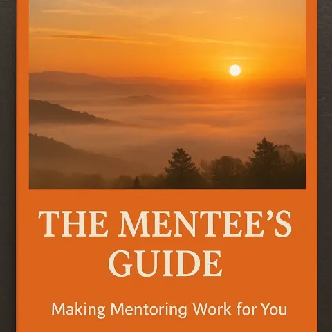 Orange Book Cover Featuring "The Mentee's Guide" Title