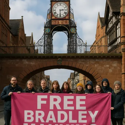 Protesters Hold a Large Pink "Free Bradley Manning" Banner