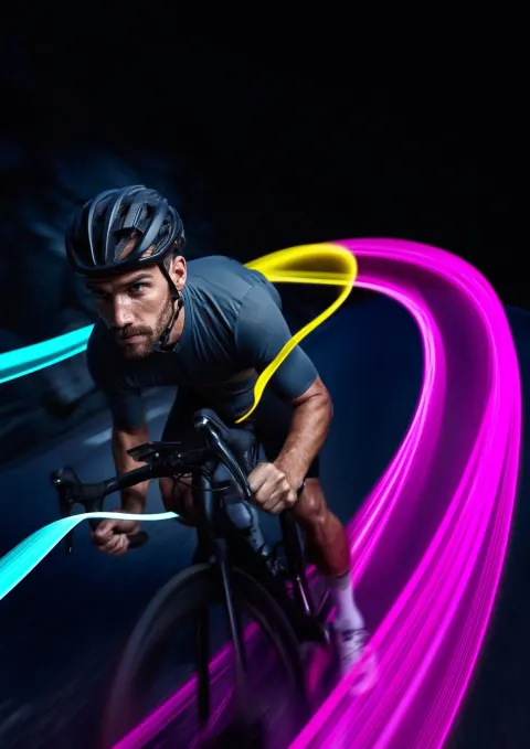 Cinematic sports photography, dynamic low angle action shot. An authentic Caucasian male cyclist in