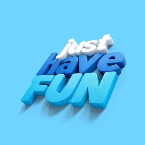 3-dimensional non-textured lettering that says, "just have fun" in all lowercase. it is 3 colors
