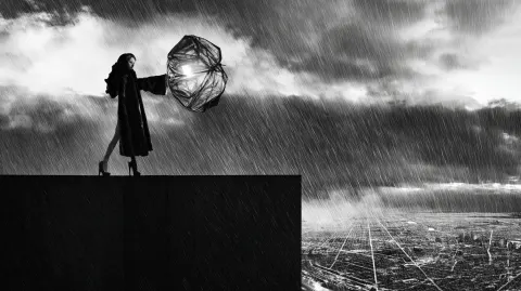 Rooftop of a brutalist concrete tower block during a downpour. a woman in a fur coat holds an inside