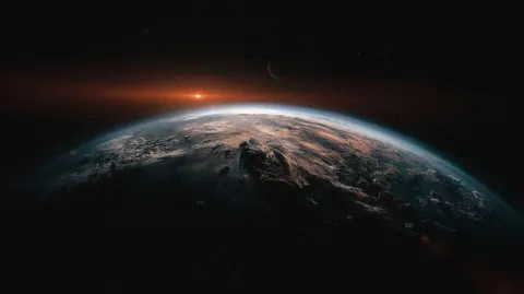 Lonely distant abandoned planet like earth in empty space covered by shadow. Stars in background
