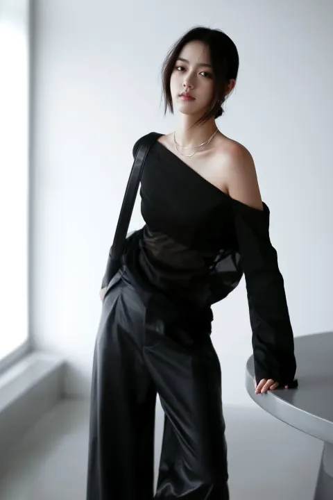 White background, full body fashion portrait of a slim young woman leaning lightly against a round t