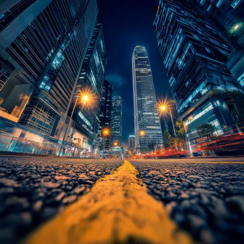 Urban CityScape at night with tall buildings camera showing street level