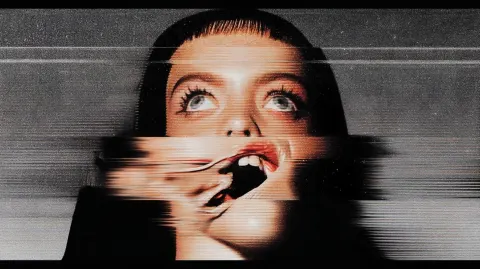 Glitch shot, woman's face melting and stretching like in The Persistence of Memory