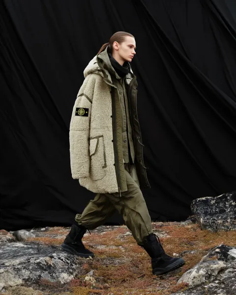 Stone Island campaign, 23 year old female Ukrainian model walking up a mountain in Greenland