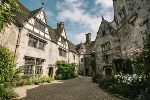 A courtyard of a english manor. Realism. Tudor flair. Photograph.