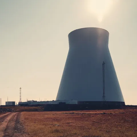Hi-tech nuclear reactor on a sunny morning in a northern landscape. Early morning moody documentary