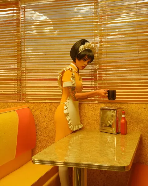 A sun-bleached 1970s roadside diner frozen in an eternal golden afternoon
