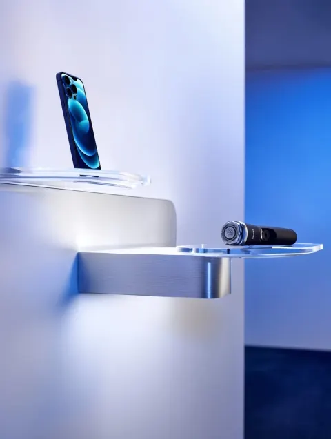 Compact wall-mounted futuristic balance installation for a Philips exhibition display