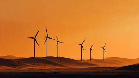 Wind turbines in countryside at sunset ultra realistic