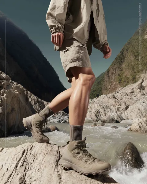 Realistic photo of a male traveler hiking in nature, wearing minimalistic outfit