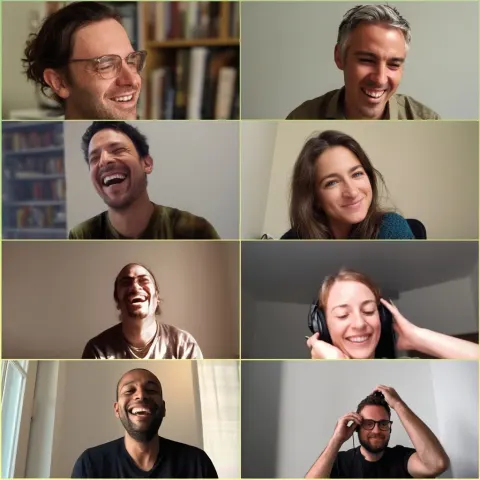 A Zoom gallery view with 8 participants in a 3x4 grid. A few people are smiling while someone else i
