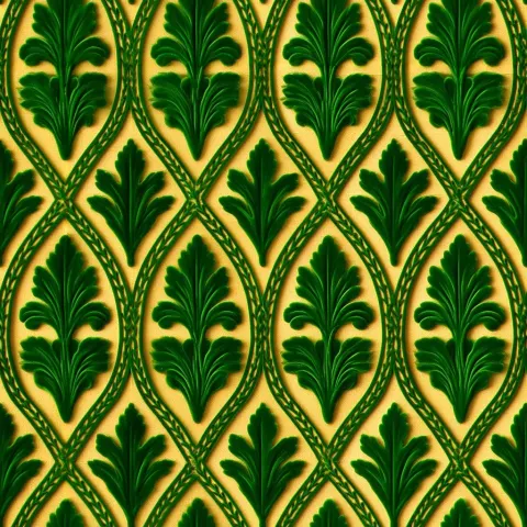 A seamless ogee repeat pattern in the style of 14th century Venetian cut velvet. Each pointed oval c