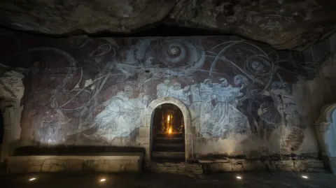 An intricate wall painting of the white lightmonks fighting against the dark forces of evil